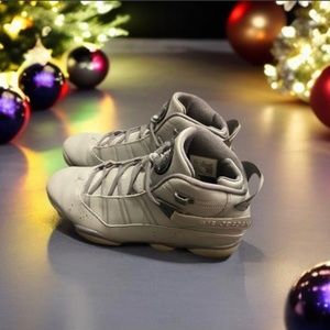 Grey Jordan’s  size 11.5